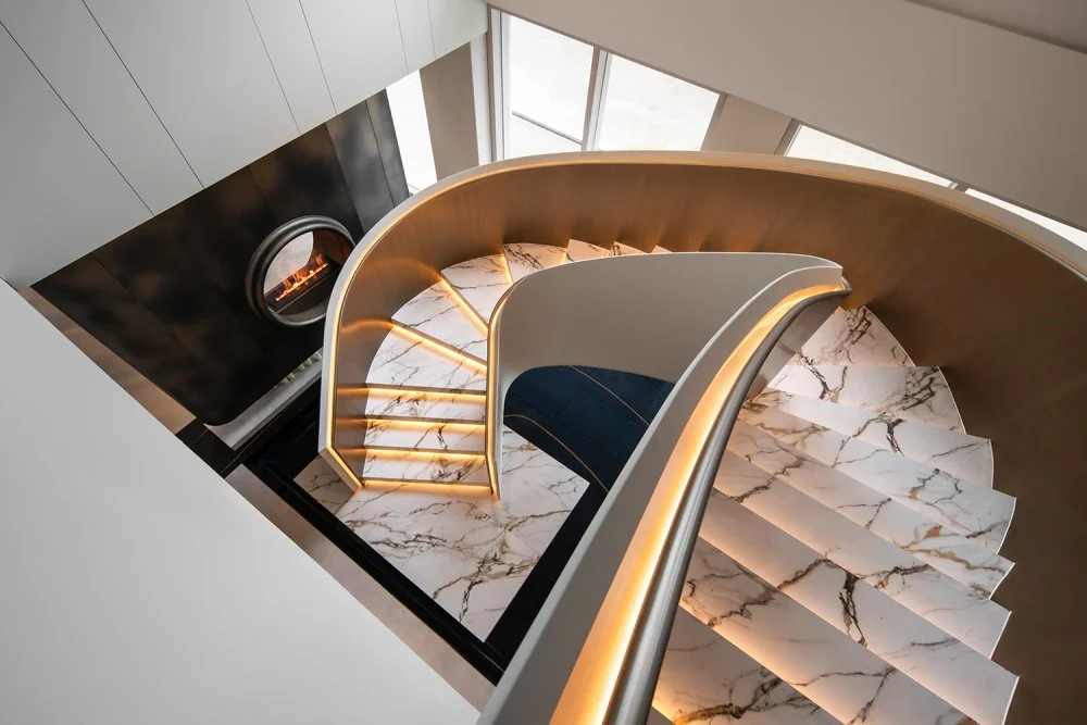 Sculptural stair showing how stone can follow a flowing architectural shape